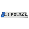 Biała tablica rejestracyjna z czarnym napisem „L1 POLSKA” i niebieskim eurobandem PL, pokazana pod kątem.