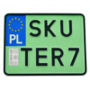 Zielona tablica rejestracyjna z czarnym oznaczeniem SKU TER7, przedstawiona na wprost na białym tle. Tablica ma niebieski euroband z symbolem Unii Europejskiej i oznaczeniem PL oraz hologram zabezpieczający.